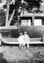 Schlack girls on running board